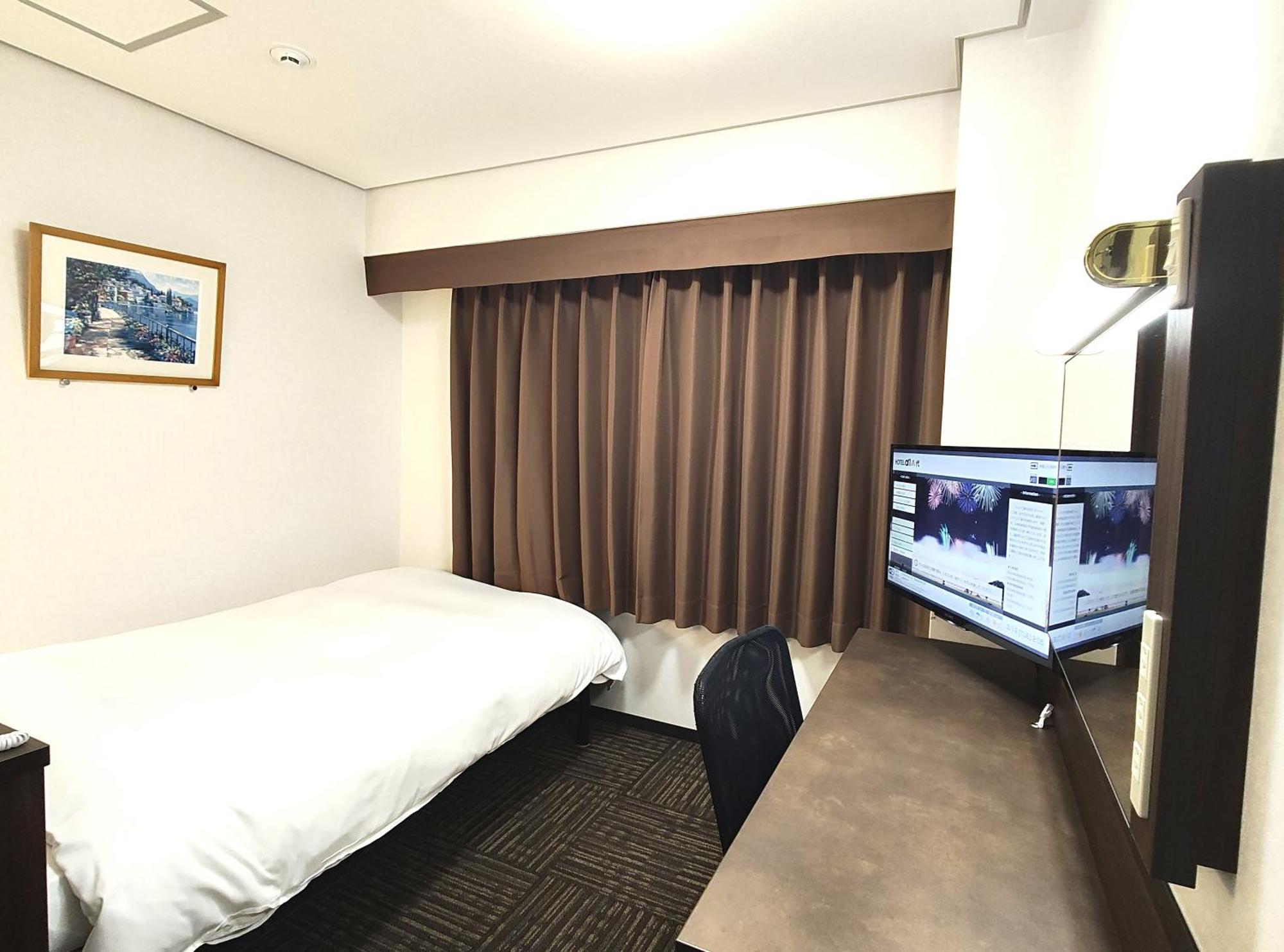 Hotel Alpha-One Yatsushiro Rum bild